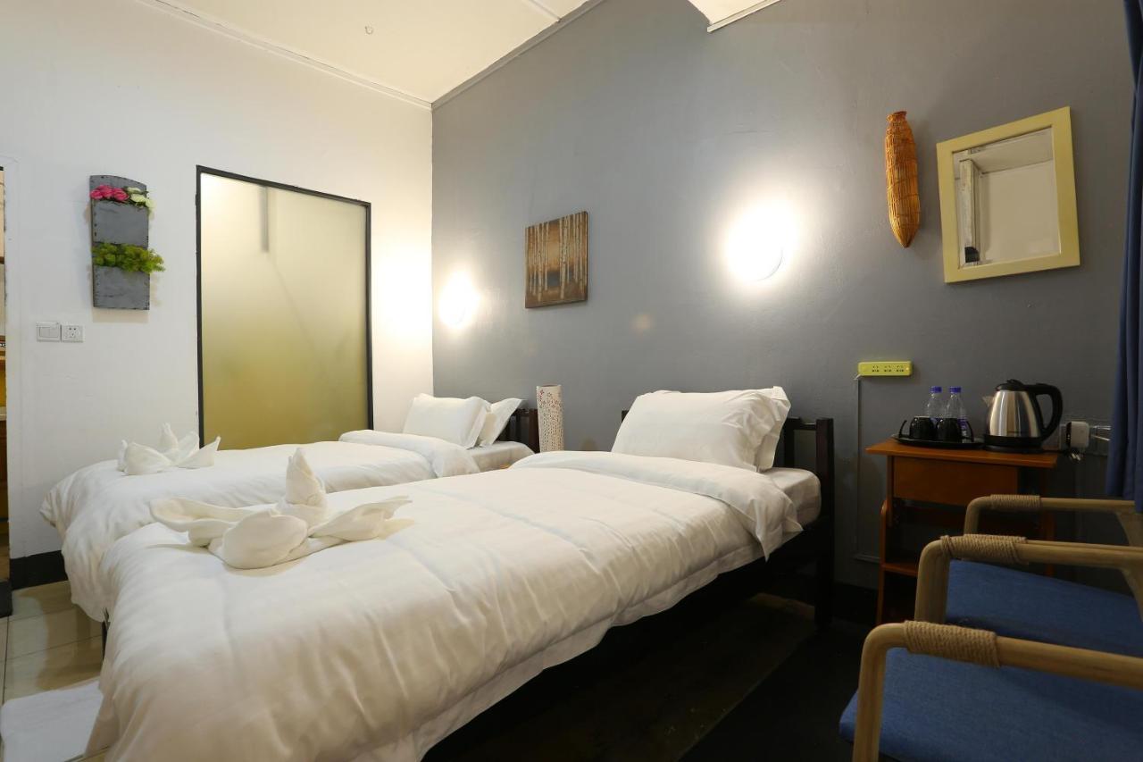 1M Hotel Vientián Szoba fotó
